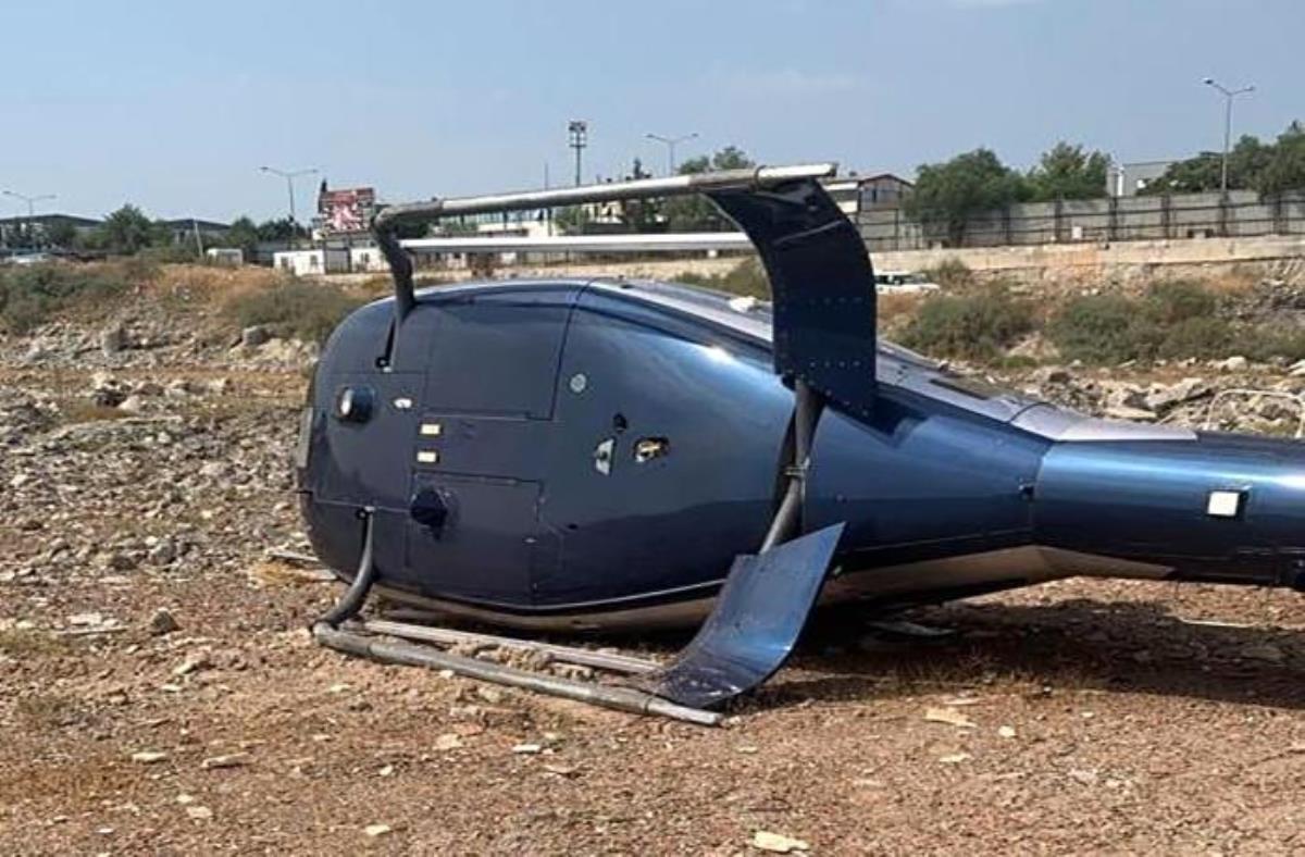 İzmir'de pervanesi yere çarpan helikopter yan yattı: 2 yaralı