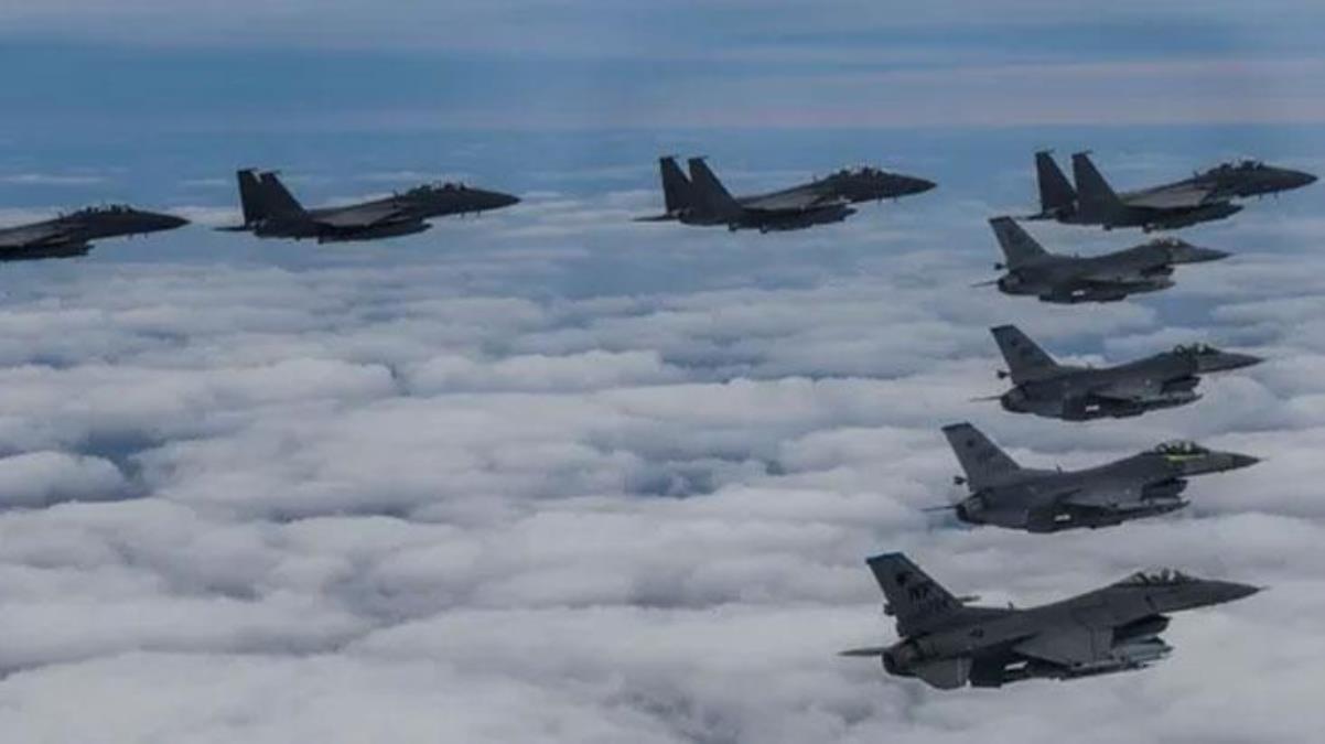 Yarımada'da savaş çanları çalıyor! Kuzey Kore, 180 savaş uçağı ile Güney Kore'ye gözdağı verdi